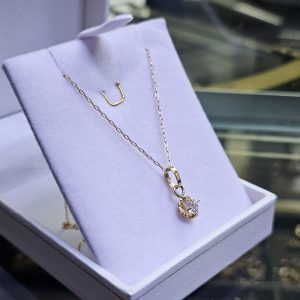 Cadena mas colgante punto de luz chaton, oro 18 Kilates